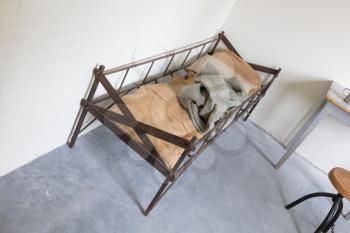 Bed in an dark old dutch jail