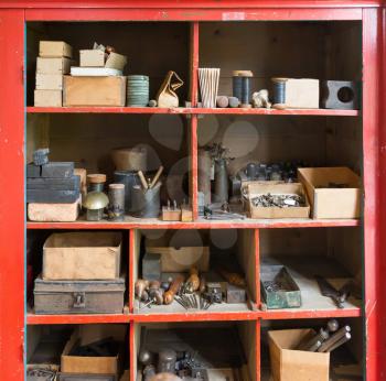 Closet in a garage - Filled with vintage tools