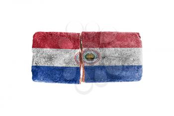 Brick with broken glass, violence concept, flag of Paraguay