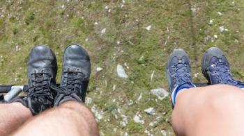 Male and female hiker riding a chairlift - Summer in Austria