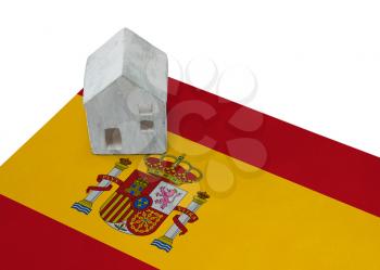 Small house on a flag - Living or migrating to Spain