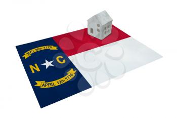 Small house on a flag - Living or migrating to North Carolina