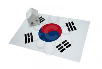 Small house on a flag - Living or migrating to South Korea