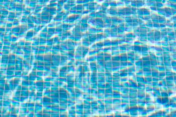 Tiled swimming pool - Filled with water - Blue, blurred