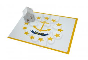 Small house on a flag - Living or migrating to Rhode Island