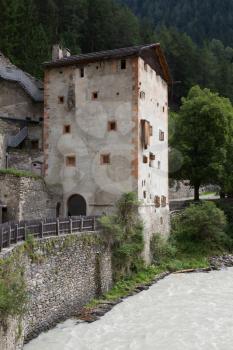 Medieval castle Altfinstermunz, in the valley of the Inn River, European Alps, near the village Nauders. The castle was built in 1472.
