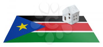 Small house on a flag - Living or migrating to South Sudan