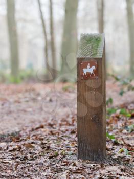 Sign for a horsetrack in a dutch forrest