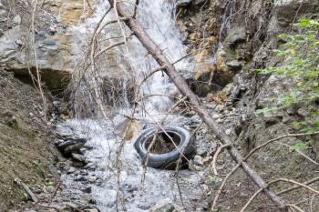 Tire left in nature - Pollution in Austria