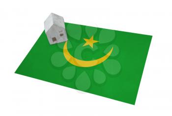 Small house on a flag - Living or migrating to Mauritania