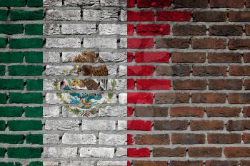 Very old dark red brick wall texture - Flag of Mexico
