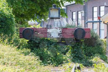Decaying railroad bumper stop on an old dutch train