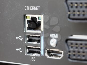 Closeup of a dirty digital multimedia box - Hdmi, scart, usb and ethernet connection