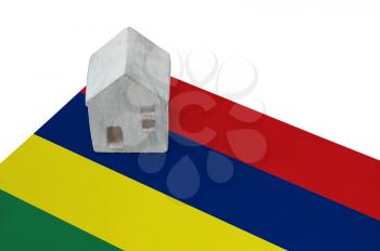 Small house on a flag - Living or migrating to Mauritius