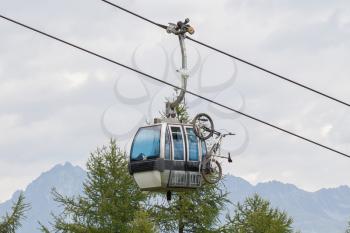 Ski lift cable booth or car with a mountainbike on the side (unmarked), Austria in summer