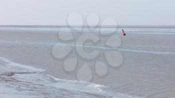 Buoy in the water - Waddensea in the Netherlands - Selective focus