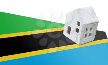Small house on a flag - Living or migrating to Tanzania