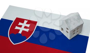 Small house on a flag - Living or migrating to Slovakia