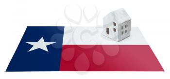 Small house on a flag - Living or migrating to Texas