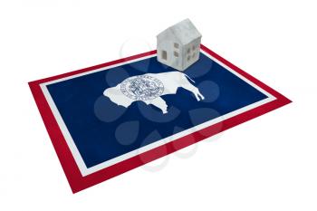 Small house on a flag - Living or migrating to Wyoming
