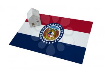 Small house on a flag - Living or migrating to Missouri