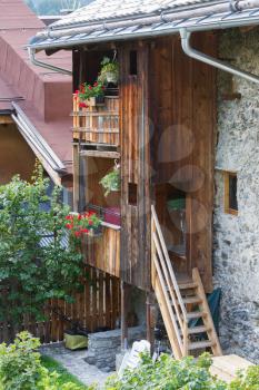 Balcony with blooming flowers at Austrian house - Alps