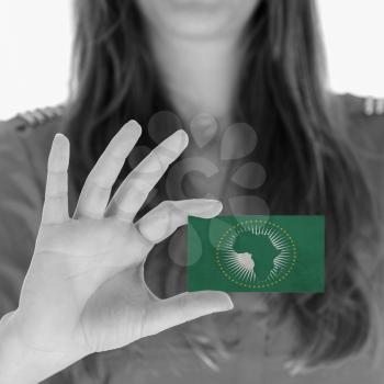 Businesswoman showing a business card - African Union