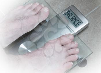Closeup of man's feet on weight scale - Balance