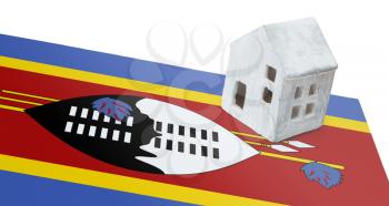 Small house on a flag - Living or migrating to Swaziland