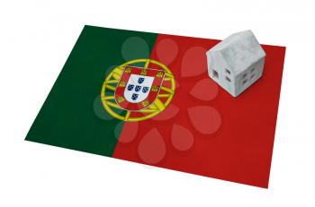 Small house on a flag - Living or migrating to Portugal
