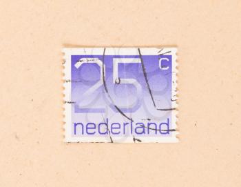 THE NETHERLANDS 1980: A stamp printed in the Netherlands shows it's value of 25 cents, circa 1980