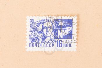 CCCP - CIRCA 1966: A stamp printed in the CCCP shows a woman and a pigeon, circa 1966