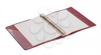 Old red ring binder isolated on a white background