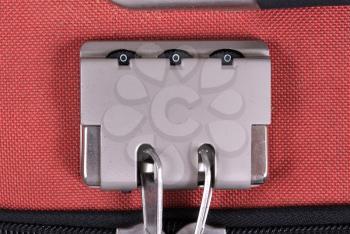 Combination lock on suitcase travel bag. Number, steel - Red bag
