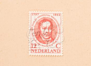 THE NETHERLANDS - CIRCA 1960: A stamp printed in the Netherlands shows a man, circa 1960