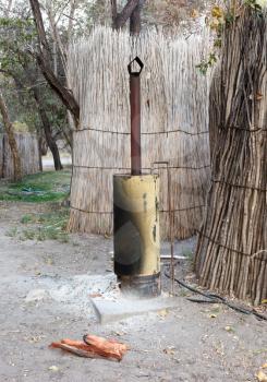 Private boiler for a shower in a campsite, Namibia
