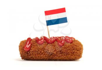 Brown crusty dutch kroket with ketchup topping isolated on a white background