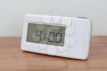 Clock radio on a desk - Time - 04.00 AM