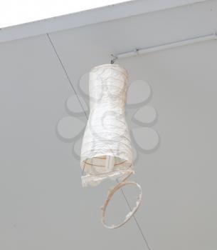 Broken white lamp in a dutch house