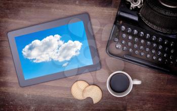 Cloud-computing connection on a digital tablet pc, vintage setting