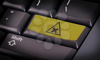 Symbol on button keyboard, warning (yellow) - irritating