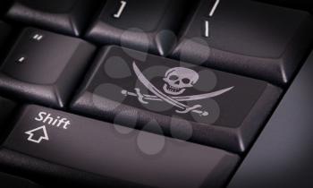 Symbol on button keyboard, pirate - concept of criminality