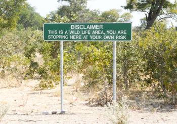 Disclaimer in a picknick area in Botswana, Wildlife area