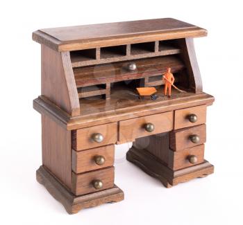 Small vintage wooden desk, small man cleaning - Clean desk policy