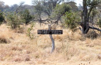 Sign in the Kalahari, staff only - Botswana