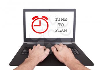 Man working on laptop, time to plan, isolated