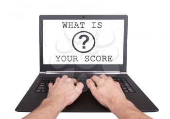 Man working on laptop, what is your score, isolated