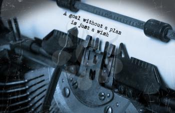 Close-up of an old typewriter with paper, perspective, selective focus, a goal without a plan is just a wish
