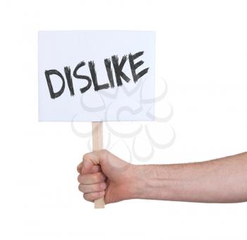 Hand holding sign, isolated on white - Dislike