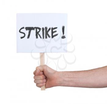 Hand holding sign, isolated on white - Strike
